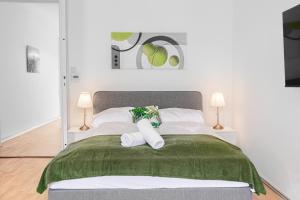 A bed or beds in a room at Pleasing 2BR Apt. AKH-Perfect for Groups