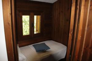 Postel nebo postele na pokoji v ubytování Chalet Maria