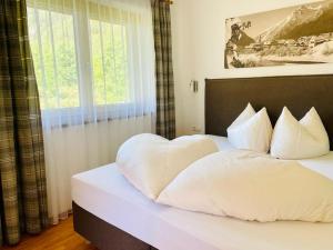 Postel nebo postele na pokoji v ubytování Haus Schuchter