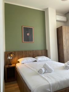 Postel nebo postele na pokoji v ubytování Villa Flora