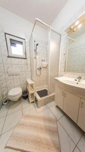 Kúpeľňa v ubytovaní Planikovica Apartments