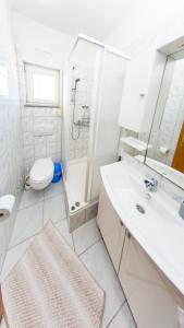 Kúpeľňa v ubytovaní Planikovica Apartments
