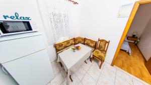 Kuchyňa alebo kuchynka v ubytovaní Planikovica Apartments