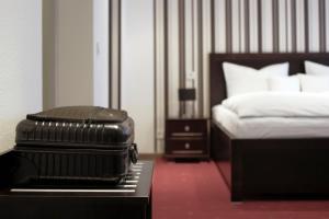 Кровать или кровати в номере Limes Hotel