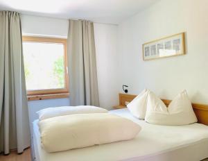 Postel nebo postele na pokoji v ubytování Haus Schuchter