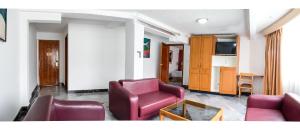 TV a/nebo společenská místnost v ubytování Hotel la Giralda