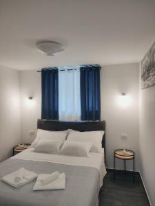 Posteľ alebo postele v izbe v ubytovaní Apartment Marino Split