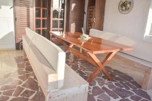 Posedenie v ubytovaní ALEXANDRE MAISON Beachfront Gialova Vacation Home