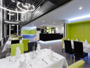 Reštaurácia alebo iné gastronomické zariadenie v ubytovaní A-Austerlitz Hotel