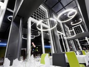 Reštaurácia alebo iné gastronomické zariadenie v ubytovaní A-Austerlitz Hotel