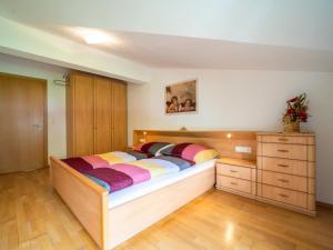 Łóżko lub łóżka w pokoju w obiekcie Apartment Aringer
