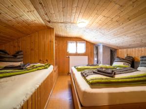 Кровать или кровати в номере Ferienhaus Vonderleu