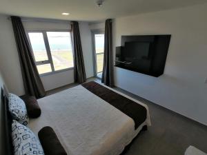 Voodi või voodid majutusasutuse Parana Playa 1103 toas