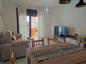 TV a/nebo společenská místnost v ubytování Apartment in Ayamonte with River Views