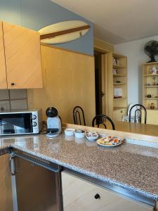 A kitchen or kitchenette at Oasi