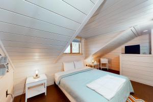 Cama o camas de una habitación en Dark Harbour Cottage
