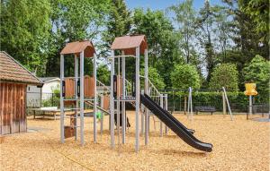 a playground with a slide in a park at 3 Bedroom Pet Friendly Home In Epe in Epe