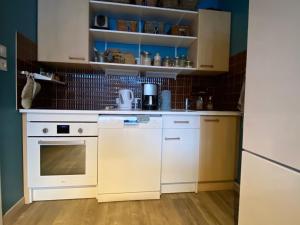 Kuchyňa alebo kuchynka v ubytovaní Appart 50m2 à Villard-de-Lans, 6 pers, 2 ch, balcon, ascenseur - FR-1-515-143