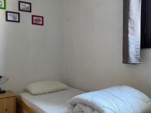 Posteľ alebo postele v izbe v ubytovaní Appart 50m2 à Villard-de-Lans, 6 pers, 2 ch, balcon, ascenseur - FR-1-515-143