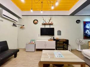 TV a/nebo společenská místnost v ubytování Mini House