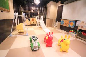 a room filled with lots of different types of toys at Hotel & Resort Bali Tower Tennoji in Osaka