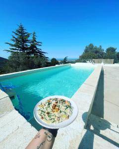 Bazén v ubytování Il Rifugio Luxury House & Spa nebo v jeho okolí