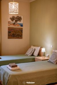 Postel nebo postele na pokoji v ubytování HELIANTHOS VILLA - APARTMENT No2 + 37 fotografií