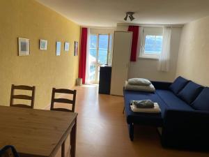 Гостиная зона в Ferienwohnungen mit 4 Betten in Gersau direkt am Vierwaldstättersee