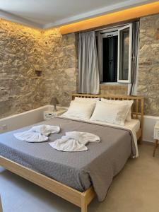 Posteľ alebo postele v izbe v ubytovaní NJ Corfu Astro Apartments