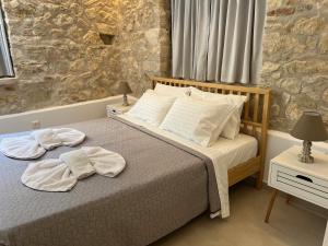 Posteľ alebo postele v izbe v ubytovaní NJ Corfu Astro Apartments