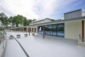 a large building with a lot of windows on it at Hotel Parrilla el Zangano in Boal