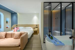 Letto o letti in una camera di Cheng Jin Hotel