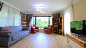 Μια τηλεόραση ή/και κέντρο ψυχαγωγίας στο Luxury Nature Life Villa