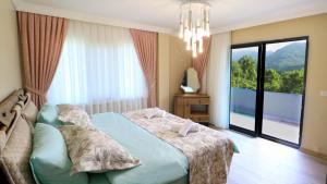 Ένα ή περισσότερα κρεβάτια σε δωμάτιο στο Luxury Nature Life Villa