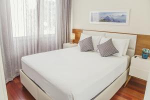 En eller flere senge i et værelse på Agradável no Leme - 100m da praia - GS703 Z5
