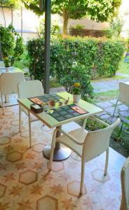 a table and chairs sitting on a patio at Tropeacentro in Tropea