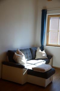 Posezení v ubytování Ferienwohnung Waldköhlerei