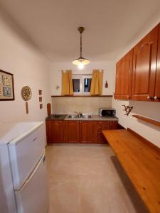 Kuchyň nebo kuchyňský kout v ubytování House Leticija rustica