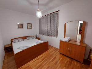 Postel nebo postele na pokoji v ubytování House Leticija rustica