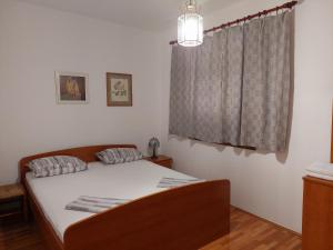 Postel nebo postele na pokoji v ubytování House Leticija rustica