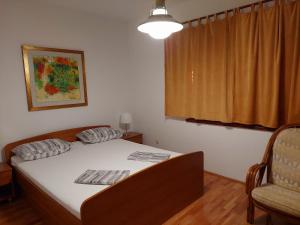 Postel nebo postele na pokoji v ubytování House Leticija rustica