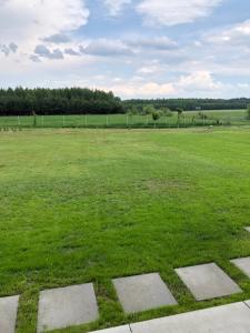 Vonkajšia záhrada v ubytovaní Apartament na Podlasiu