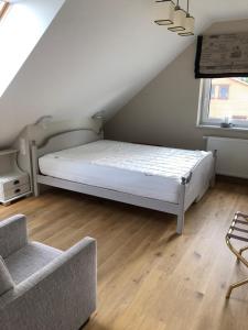 Posteľ alebo postele v izbe v ubytovaní Apartament na Podlasiu