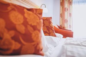 Postel nebo postele na pokoji v ubytování Hotel Vorderronach