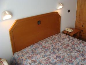Cama o camas de una habitación en Residencial Elisio