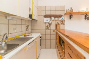 A kitchen or kitchenette at Domus Mea Még 21 kép