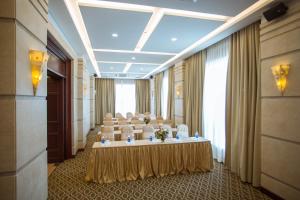 The business area and/or conference room at Minh Toan Athena Hotel
