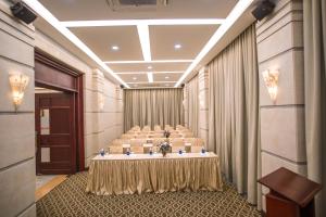 The business area and/or conference room at Minh Toan Athena Hotel