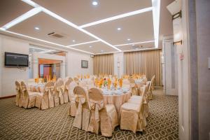 A television and/or entertainment centre at Minh Toan Athena Hotel