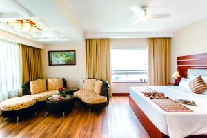 A seating area at Minh Toan Athena Hotel
